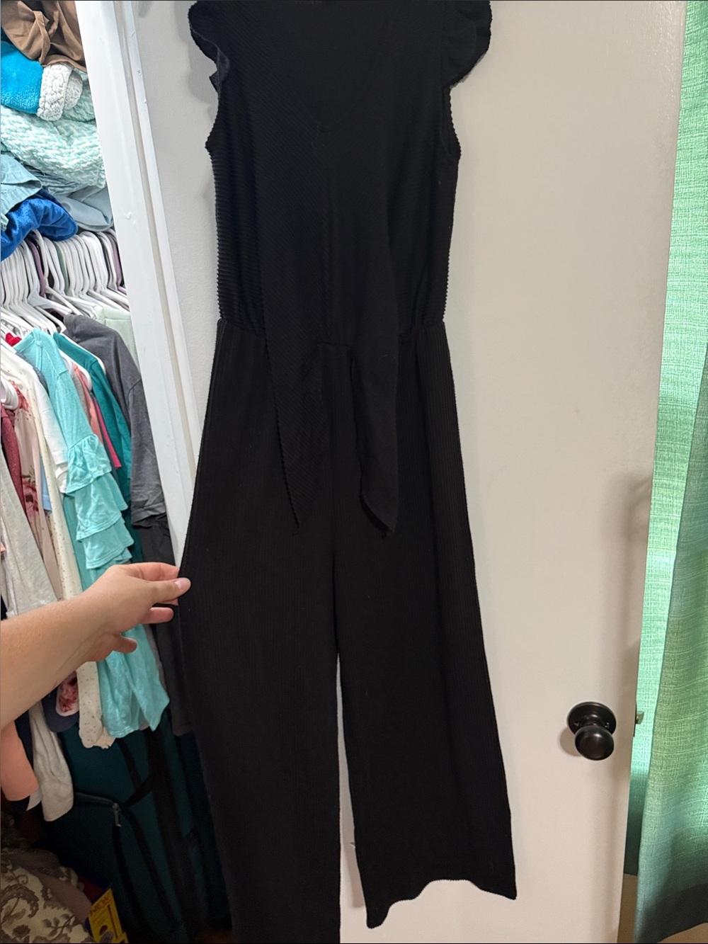 Caution To The Wind Black V-Neck Sleeveless romper with tie waist